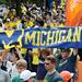 Fans hold up a Michigan banner during a live broadcast of ESPN's "College GameDay" at Ingalls Mall on the University of Michigan campus on Saturday, September 7, 2013. Melanie Maxwell | AnnArbor.com